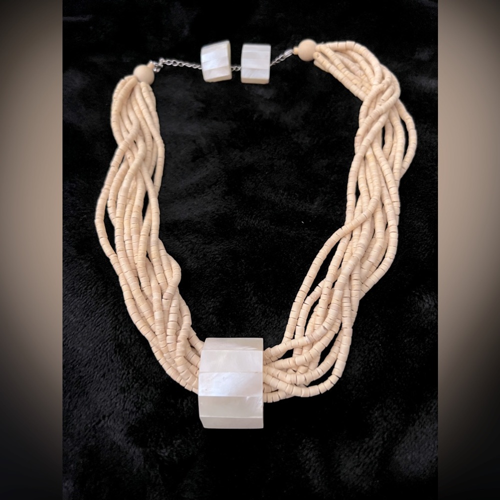 Cream bead choker with mother of pearl inspired charm and clip on earrings.